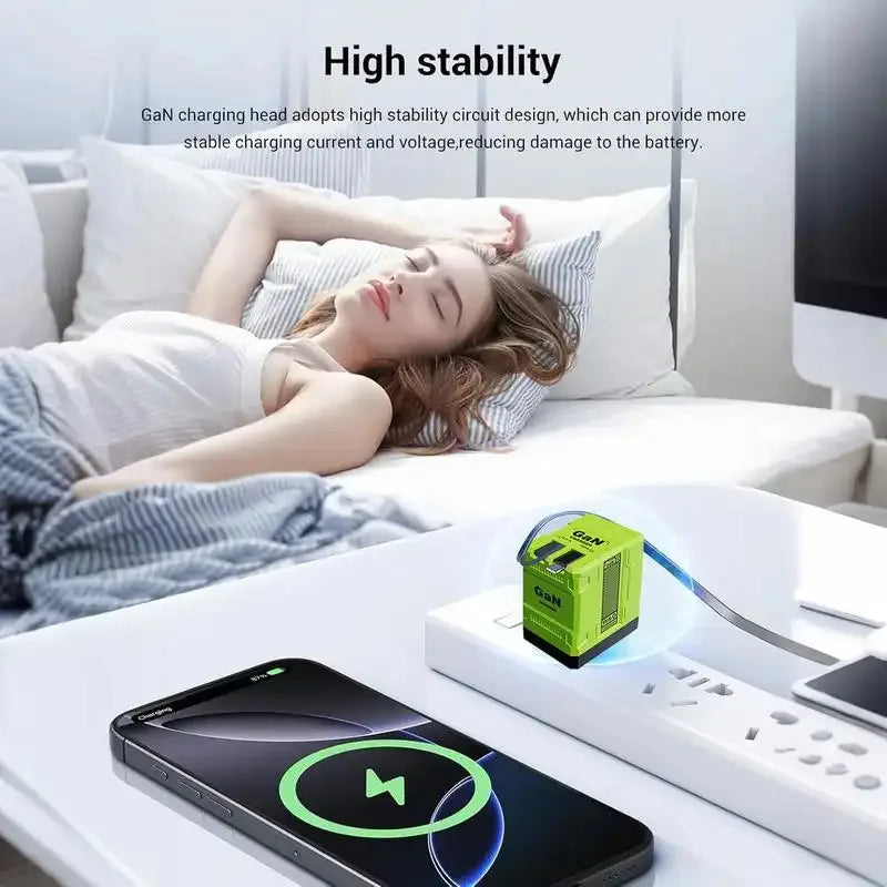 A green GaN fast charger is shown next to a smartphone on a white surface.