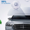 Nahaufnahme der Frontgrille und des Scheinwerfers eines silbernen Autos mit aufgetragenem Fenstertint für UV-Schutz.