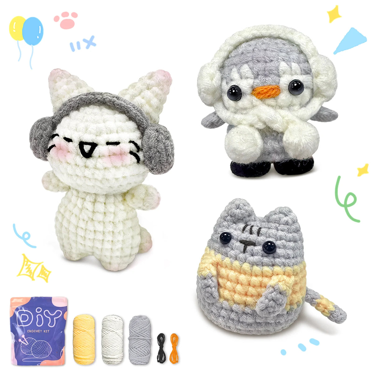A crochet kit featuring three stuffed animal figures: a white cat, a gray owl, and a gray cat, along with yarn and needles.
