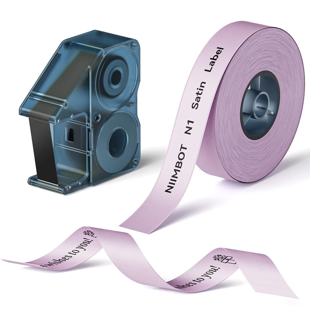 A roll of pink satin ribbon labels for a Niimbot N1 label printer