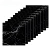 A close-up view of black marble texture tiles arranged in a diagonal, stepped pattern.