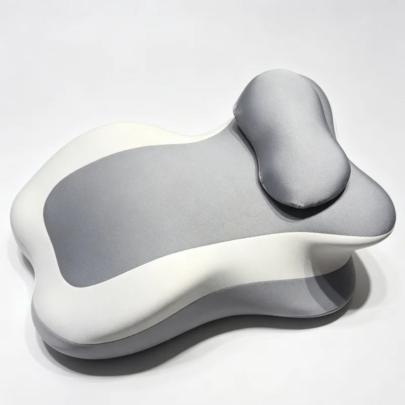 A light gray multi-positional memory foam body pillow with a removable cover shown from the side.