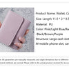A pink and light blue wallet is shown being held, displaying various slots for cash, cards, and a mobile phone.