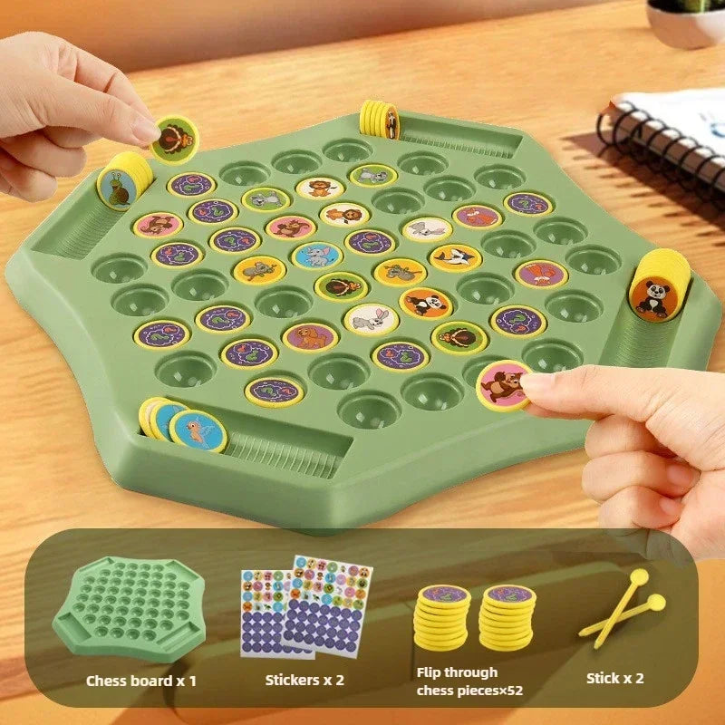A green plastic tray holds various animal stickers and yellow chess pieces for an interactive memory game.