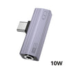 A silver-colored audio adapter with a charging port and 10W output.