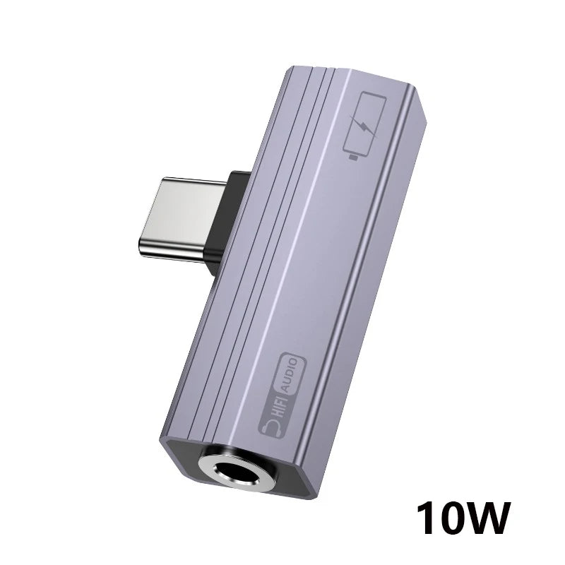 A silver-colored audio adapter with a charging port and 10W output.