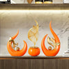 An orange ceramic sculpture shaped like a stylized leaf or flame, displayed in a modern shelf setting.