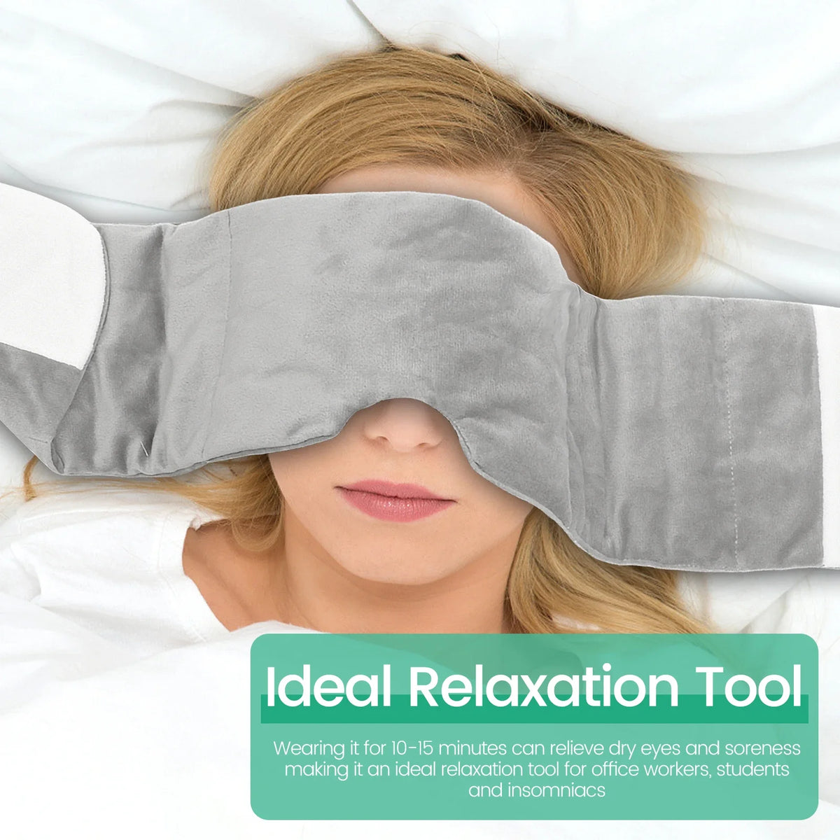 A person is wearing a gray velvet sleep mask for relaxation.