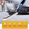 A blue hard bristle crevice cleaning brush with a non-slip handle is shown cleaning a black car.