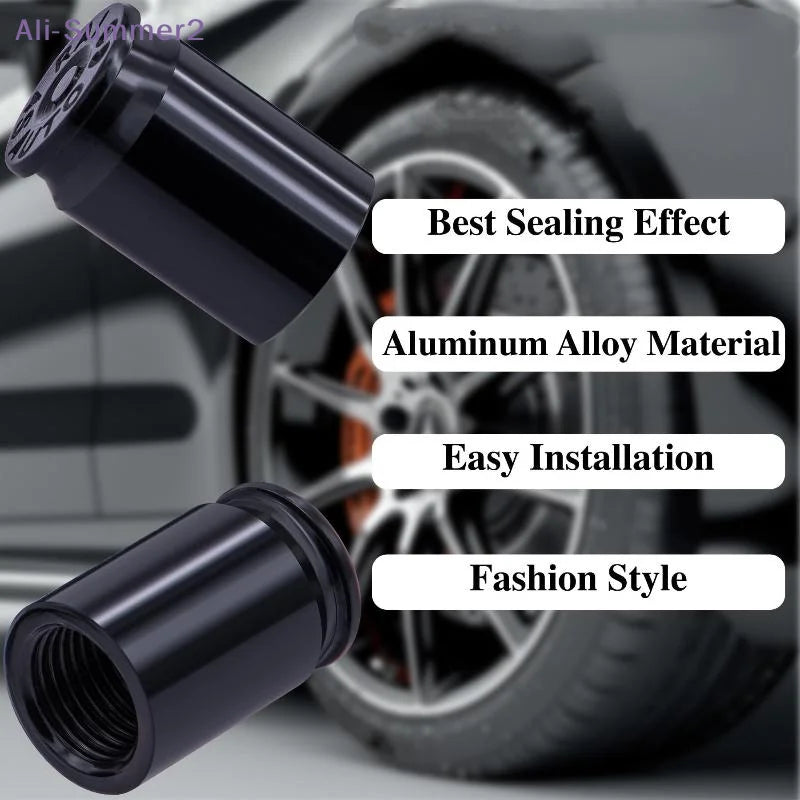 Black aluminum alloy bullet shell tire valve stem caps shown with a wheel in the background.