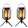 A black solar flickering flame lantern with a wire frame and glass enclosure, shown from the side.