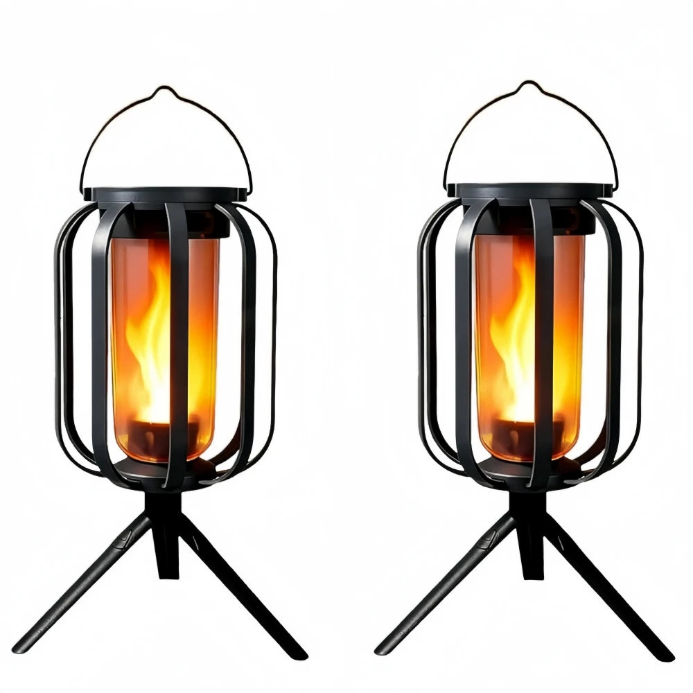 A black solar flickering flame lantern with a wire frame and glass enclosure, shown from the side.