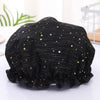 Black reusable elastic shower cap with gold star pattern