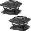 A black solar post cap light with a glass lens and warm LED for outdoor lighting.