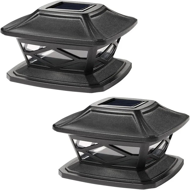 A black solar post cap light with a glass lens and warm LED for outdoor lighting.
