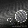 Close-up of a black bath mat showing a circular texture detail and text describing its rubber composition.