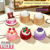 A set of cartoon dessert clicker keychains featuring various flavors and colors like pink, red, and purple.