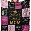 A black and pink fleece throw blanket featuring inspirational quotes about motherhood and love.
