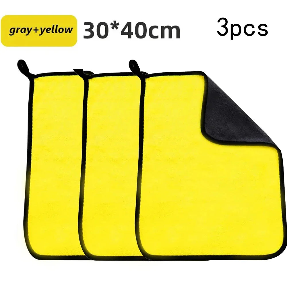 Three yellow and gray microfiber car cleaning towels are displayed side by side.