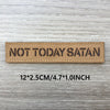 A rectangular tan woven patch with the text NOT TODAY SATAN on it, measuring 12x2.5cm or 4.7x1.0inch.