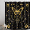 Black shower curtain featuring a gold gothic design with a large moth, floral elements, and stars.