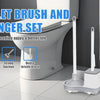 A toilet brush and plunger set with a holder displayed next to a white toilet.