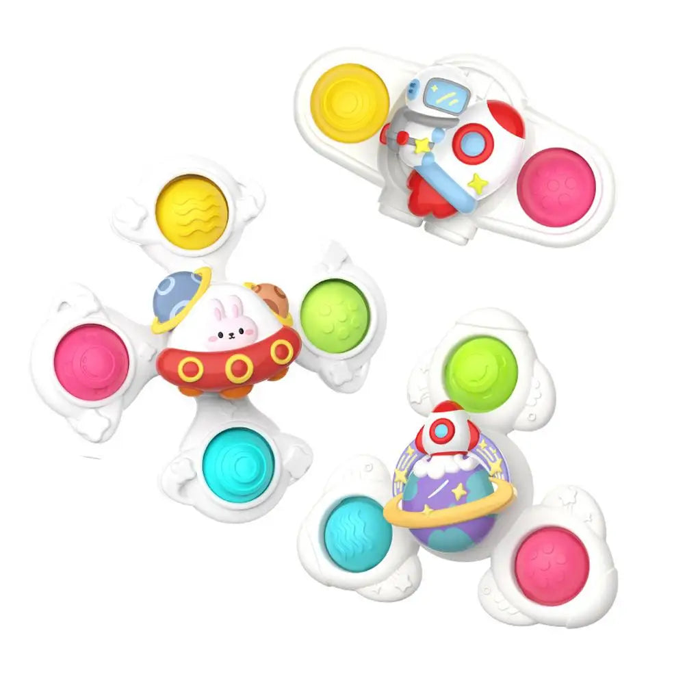 A set of baby suction cup spinner toys with rattling sensory beads in various colors and shapes.