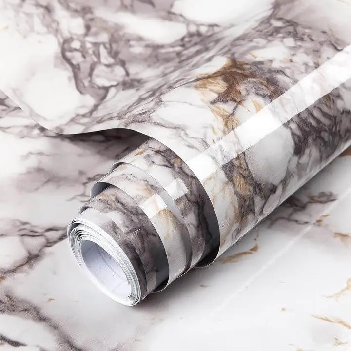 Roll of marble peel-and-stick wallpaper featuring gray and beige veining on a white background.