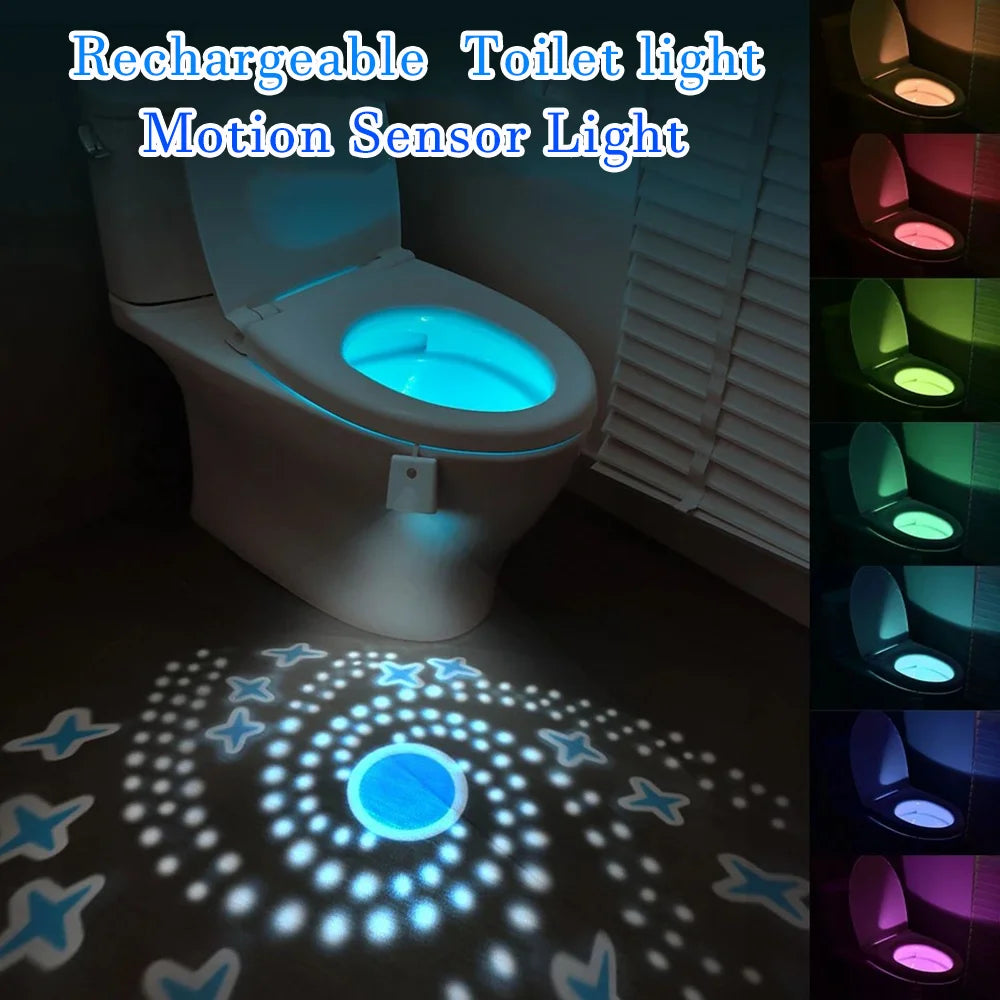A rechargeable motion sensor toilet light illuminating a bathroom floor with a circular blue glow.
