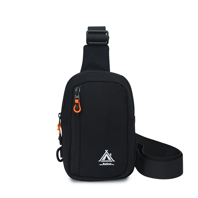 Black water-resistant nylon chest sling bag with a strap and carabiner clip