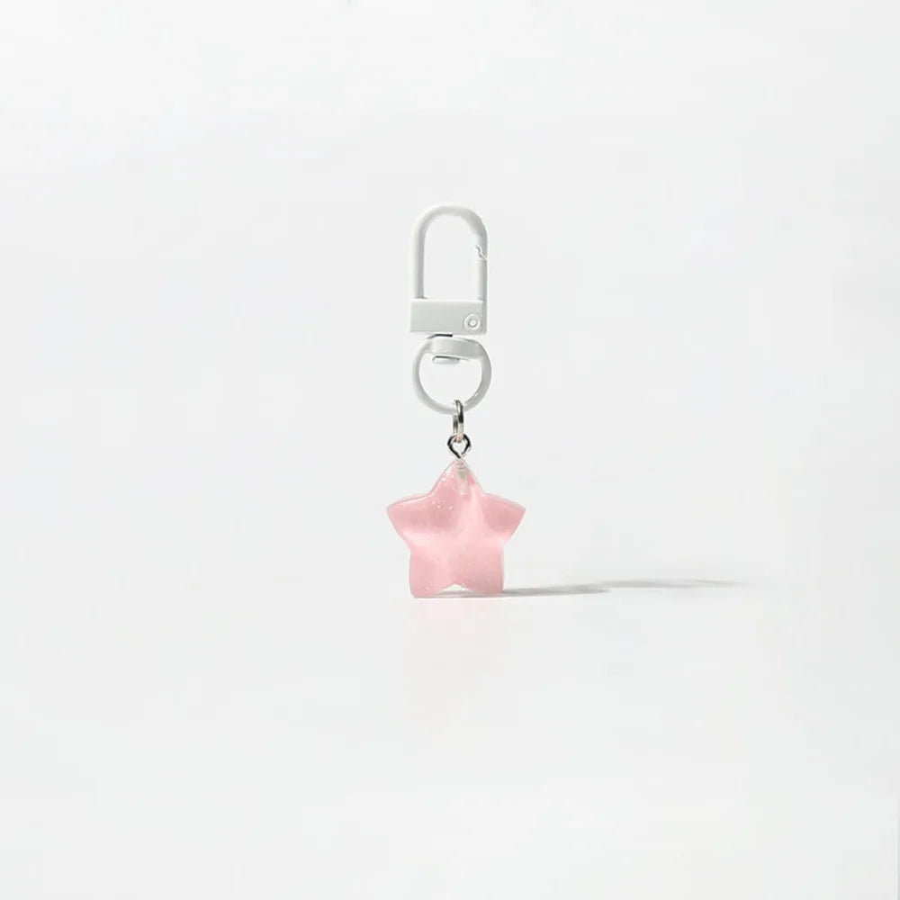 Silver hook necklace with a pink shell-shaped charm