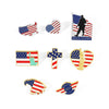 A collection of enamel pins featuring American flag designs, including a veteran silhouette, patriotic hearts, and flag cross