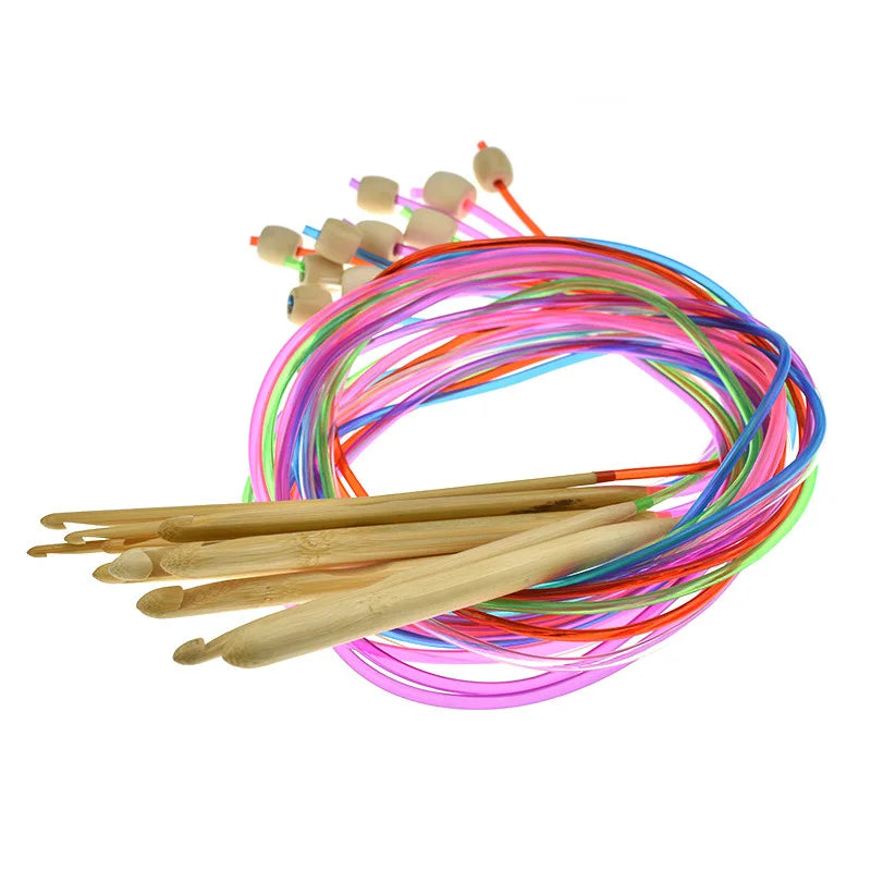 A coil of 23-piece Tunisian crochet hooks featuring bamboo cables in various bright colors.