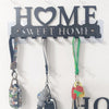 Black rustic iron wall hooks for keys and coats with decorative charms