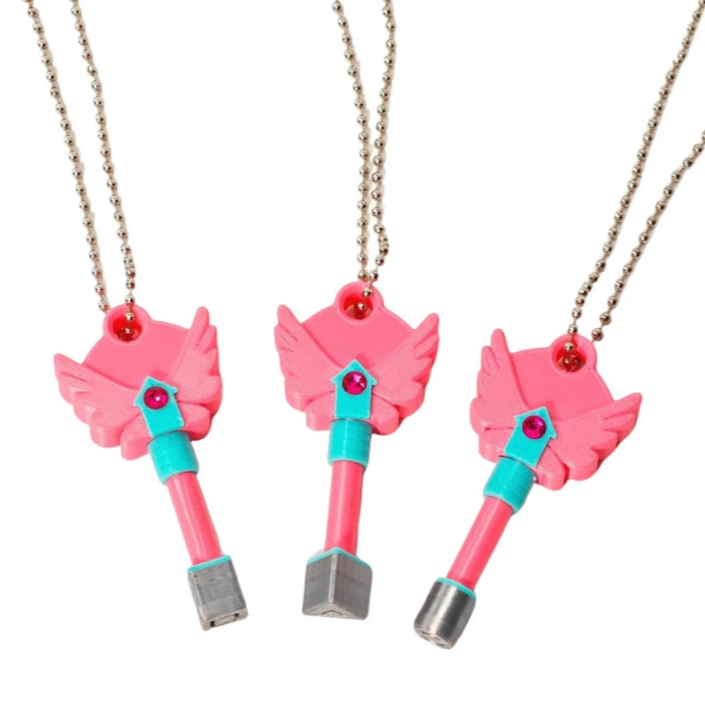 Set of four pink dagger key necklaces with silver chains and colored accents