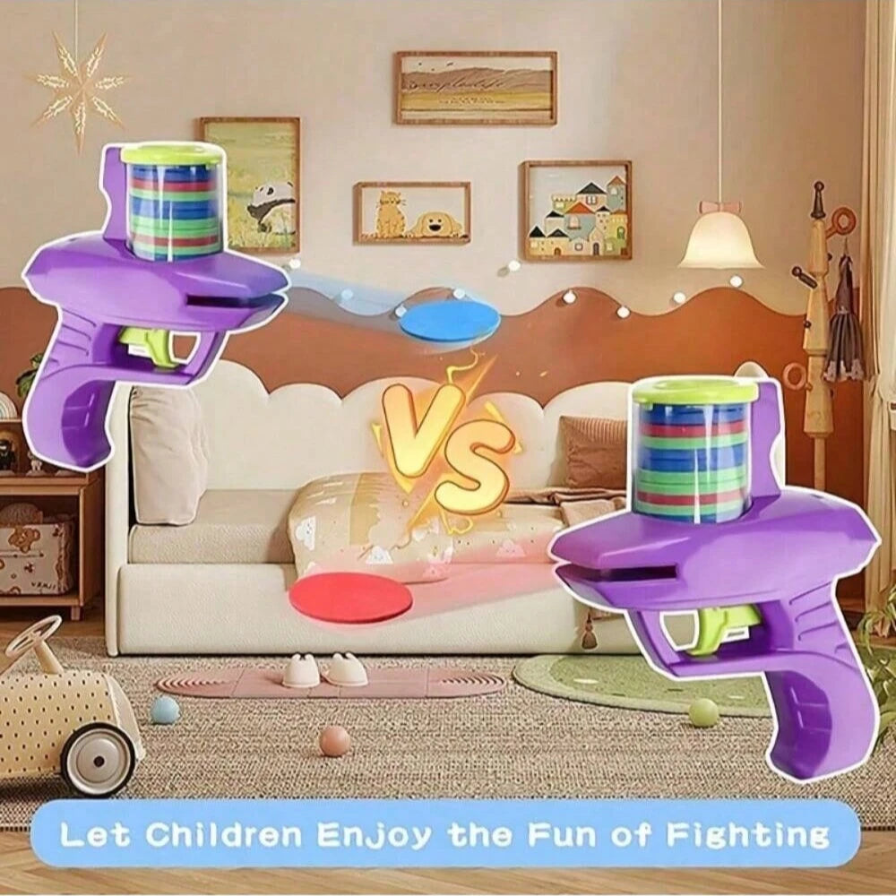 A purple foam disc launcher toy is shown against a background with framed pictures and a sofa, suggesting a fighting game the
