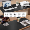 A white waterproof PU leather desk pad is shown with various office supplies like a laptop, printer, and writing materials on