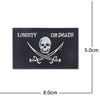 Black embroidered patch featuring a skull and crossbones design with the text Liberty or Death