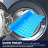 A blue non-slip shower mat with suction cups is shown inside a washing machine drum.