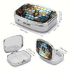 A silver metal pill organizer and jewelry case with a lid showing an intricate bee design.