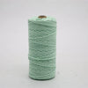 A spool of light mint green macrame cord for crafting, measuring 3mm/4mm and 100 meters long.