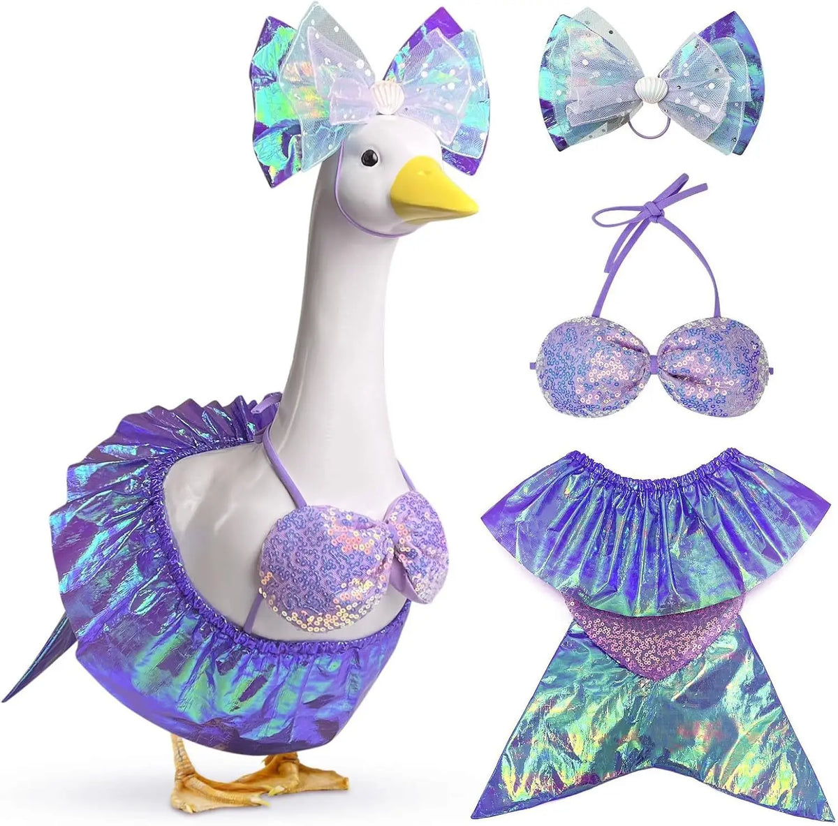 A white lawn goose statue wearing a purple iridescent mermaid bikini costume with sheer purple wings.
