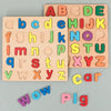 A wooden alphabet puzzle featuring large letters and lowercase letters cut from natural wood blocks.