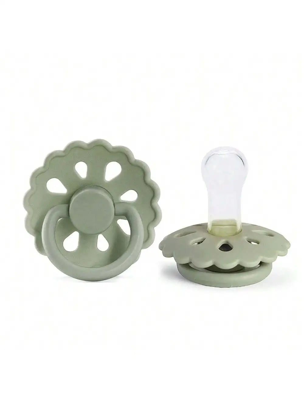 A silicone baby pacifier with a light green, flower-shaped silicone ring and a clear silicone nipple.