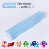 A bundle of light blue chenille pipe cleaners with various animal shapes.