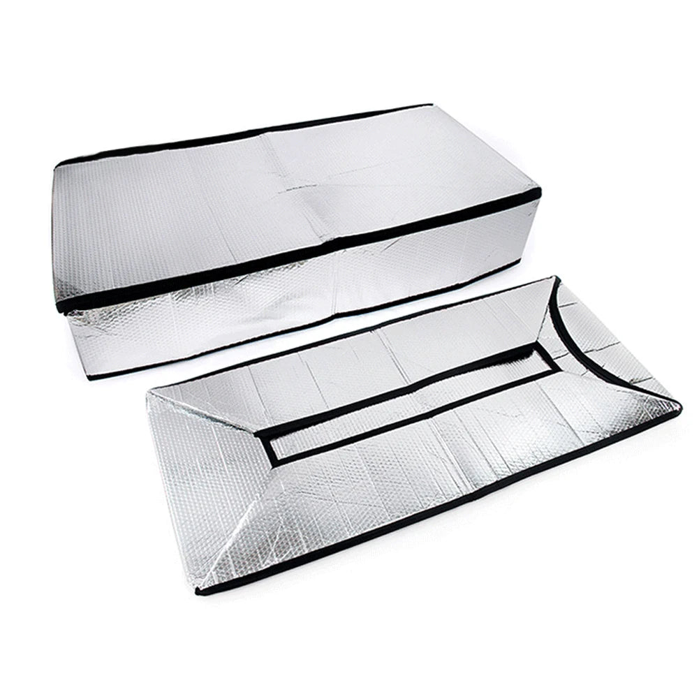Silver foil insulation cover for attic stairway, showing a rectangular piece and a slanted piece.