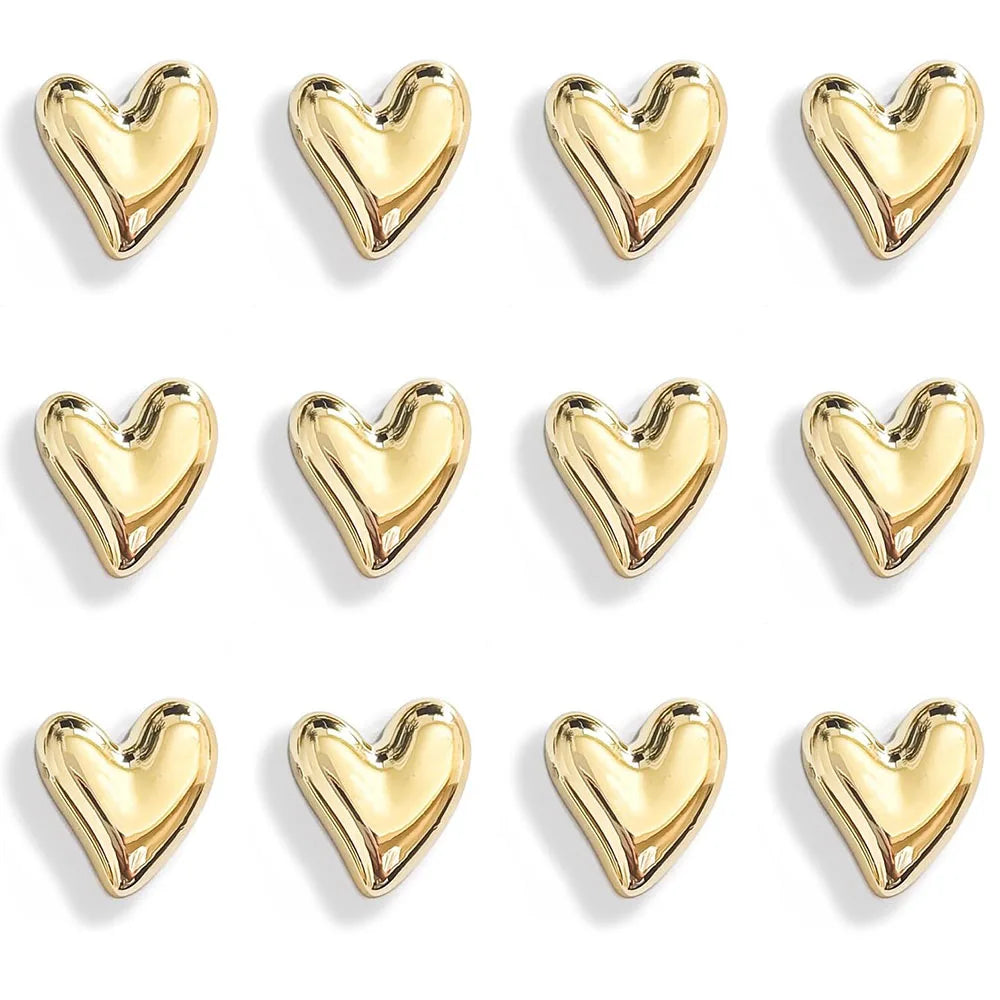 A set of twelve gold mini heart-shaped refrigerator magnets arranged in a grid.