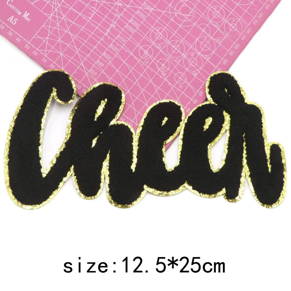 Black and gold glitter chenille letter patch spelling Cheer