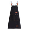 A dark navy canvas kitchen apron with light gray straps and large pockets.