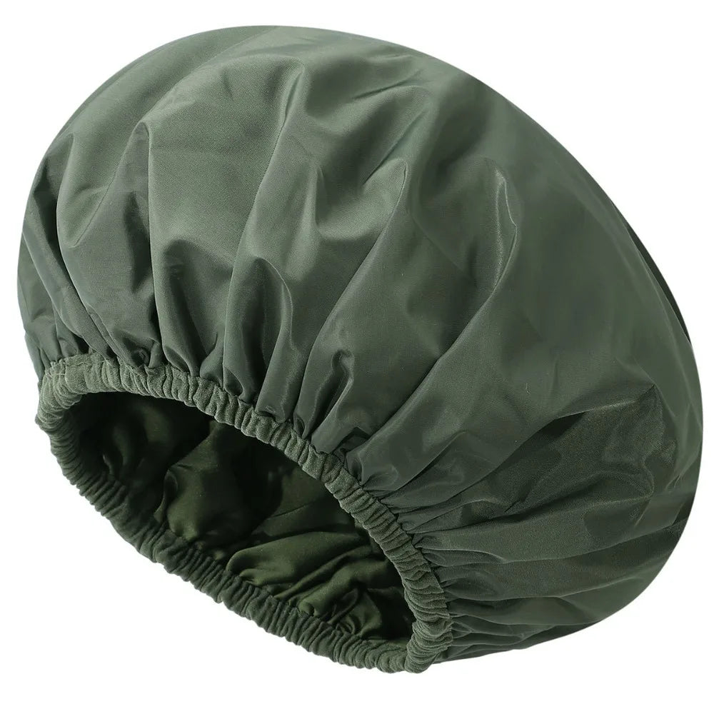A dark olive green satin-lined waterproof shower cap for hair protection.